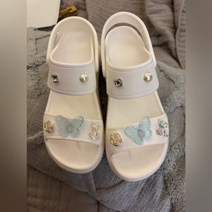 Crocs white Mega Crush Sandals. With Jibbets size 9